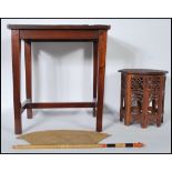 An early 20th Century carved hardwood occasional table from Sri Lanka, the rectangular top carved in