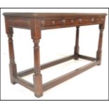 An early 20th Century Jacobean peg jointed oak low