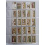 A full set of 100 Gallaher's Footballers cigarette trade cards preserved in a plastic wallet and