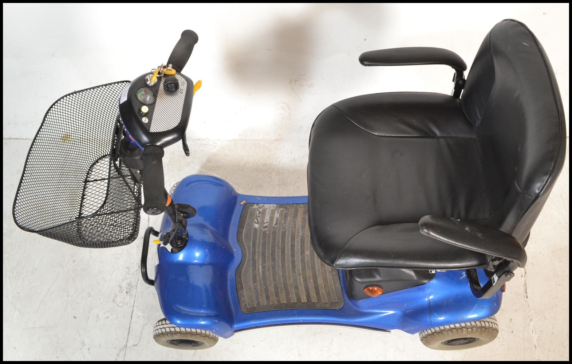 A Sterling Pearl mobility scooter having a blue painted body on four wheels with a black leather - Image 7 of 11