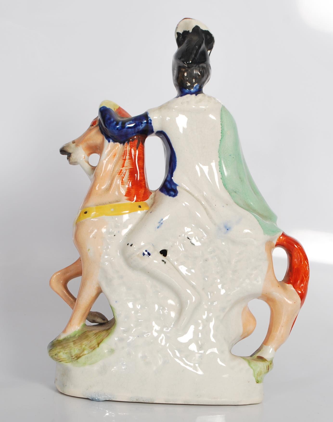 A 19th century Staffordshire flatback figurine of Louis Napoleon Emperor  of France on horseback. - Image 3 of 4