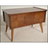 An early to mid 20th Century walnut work box / sewing box of low form, hinged top opening to