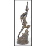A contemporary large bronze figure of the Greek god pan raised on a circular steeped base.