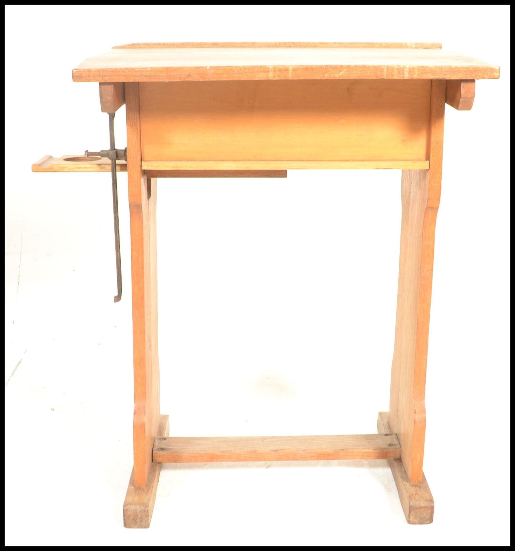 A vintage mid 20th Century beech school desk having adjustable tilt action to the top, swing out - Image 2 of 5