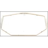 A 1920's / 30's Art Deco vintage retro frameless mirror by J. Rushworth, having eight sides with