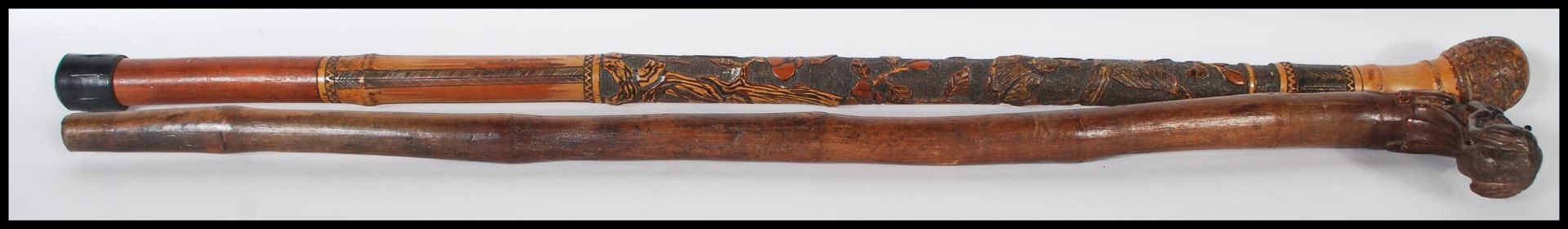 A 20th Century carved bamboo Japanese style walking stick cane decorated with carved blossoms and - Bild 2 aus 7