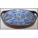 A 19th Century Booth's blue and white china hors d'oeuvres crudite set of oval form transfer printed