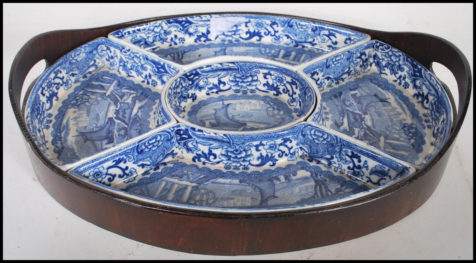 A 19th Century Booth's blue and white china hors d'oeuvres crudite set of oval form transfer printed