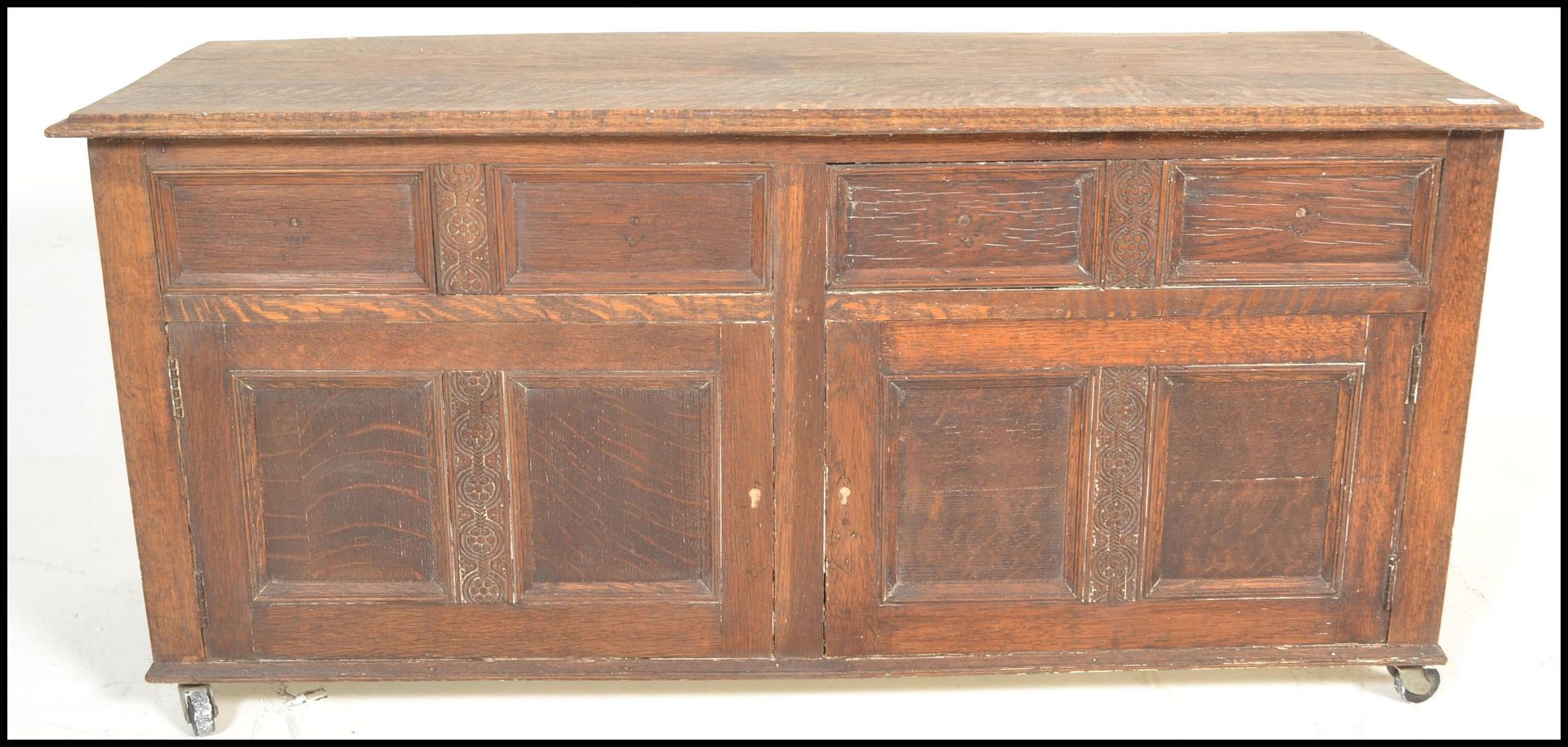 A 20th Century Jacobean revival panel oak coffer chest, panel sides and front with hinged top raised - Image 6 of 9