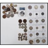 A collection British coins dating from the 19th Century to include several graded coins to include
