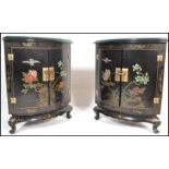 A pair of 20th Century Japanese Shibayama effect painted black lacquered corner cupboard cabinets,