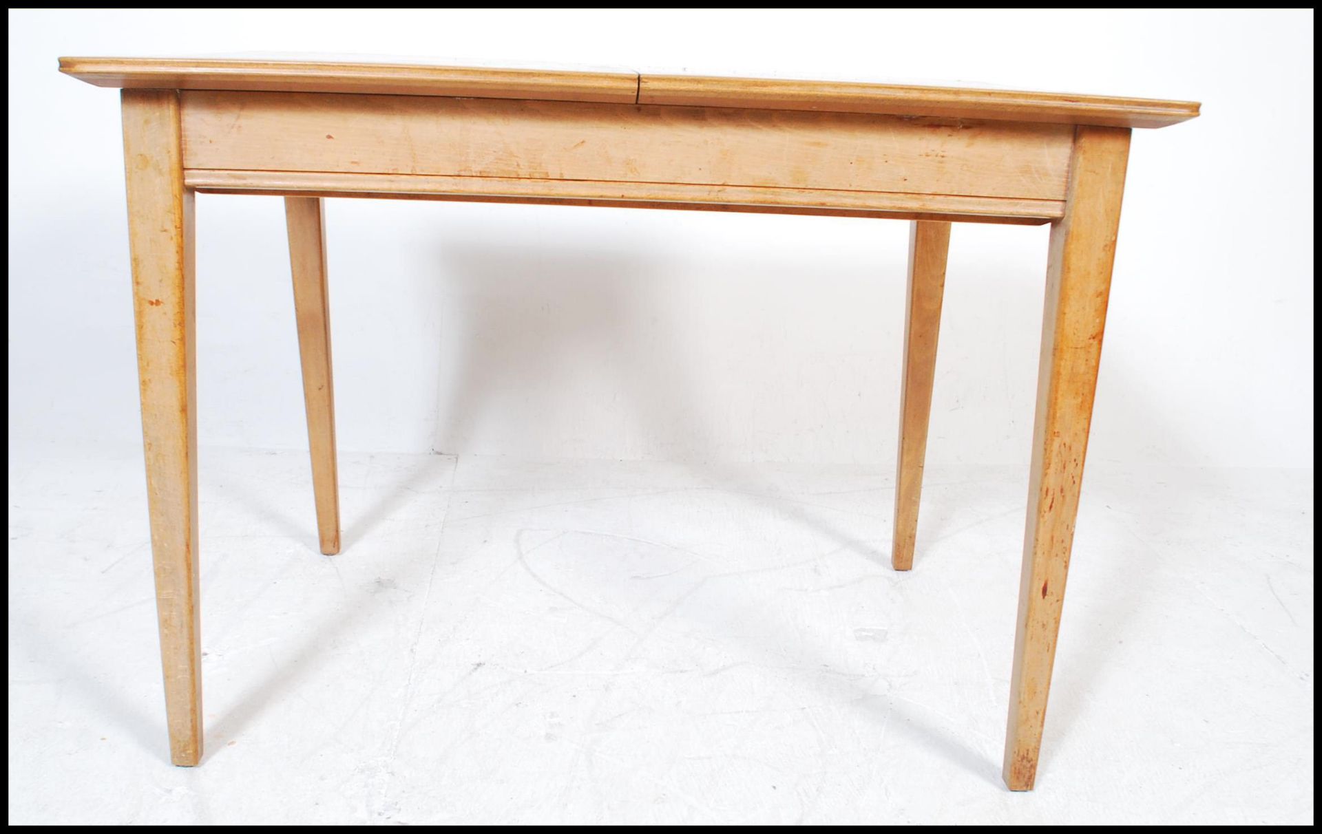 A mid 20th Century Gordon Russell walnut dining suite, comprising extending dining table, 79cm - Image 4 of 5