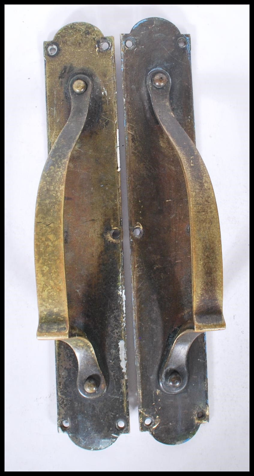 A large pair of late 19th Century Victorian Art Nouveau brass door handles. The handles of scroll