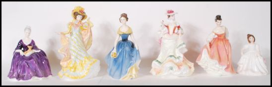 A collection of Royal Doulton ceramic figurines to include Flowers Of Love Primrose HN 3710 /
