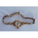 A vintage 20th Century ladies Medana Lever 17 jewels 9ct gold cocktail watch having a silvered