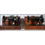 2 19th century oak cased Singer sewing machines. Each within the original dome top carry cases.