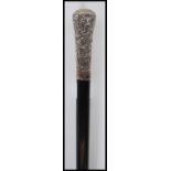 A late 19th Century / 20th Century Victorian promenade walking stick cane having a silver knop