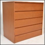 A 1960's retro vintage teak wood chest of drawers of simple form having a straight run of four