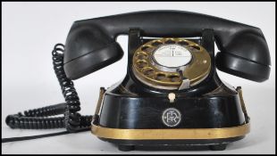 A vintage 20th Century RTT Bell kettle telephone by MFG Company circa 1950s, finished in black