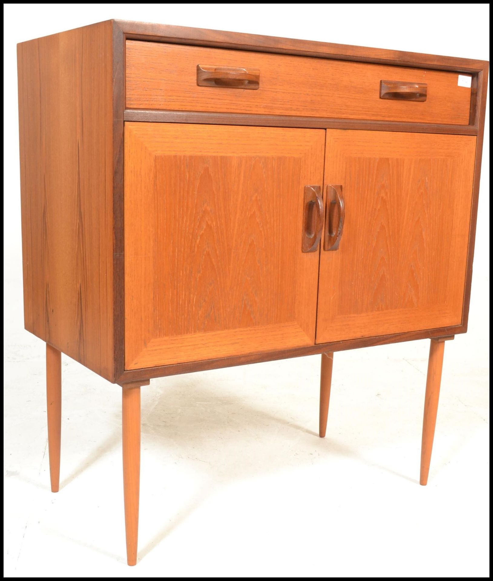 A retro 20th Century G Plan Fresco range teak wood side unit having a single drawer above a twin