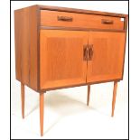 A retro 20th Century G Plan Fresco range teak wood side unit having a single drawer above a twin