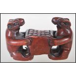 A 20th Century Japanese boxwood carved netsuke in the from of two mice. Measures 4cm tall by 7cm