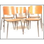 A set of 5 mid 20th century bentwood and tubular metal industrial stacking chairs. Each with painted