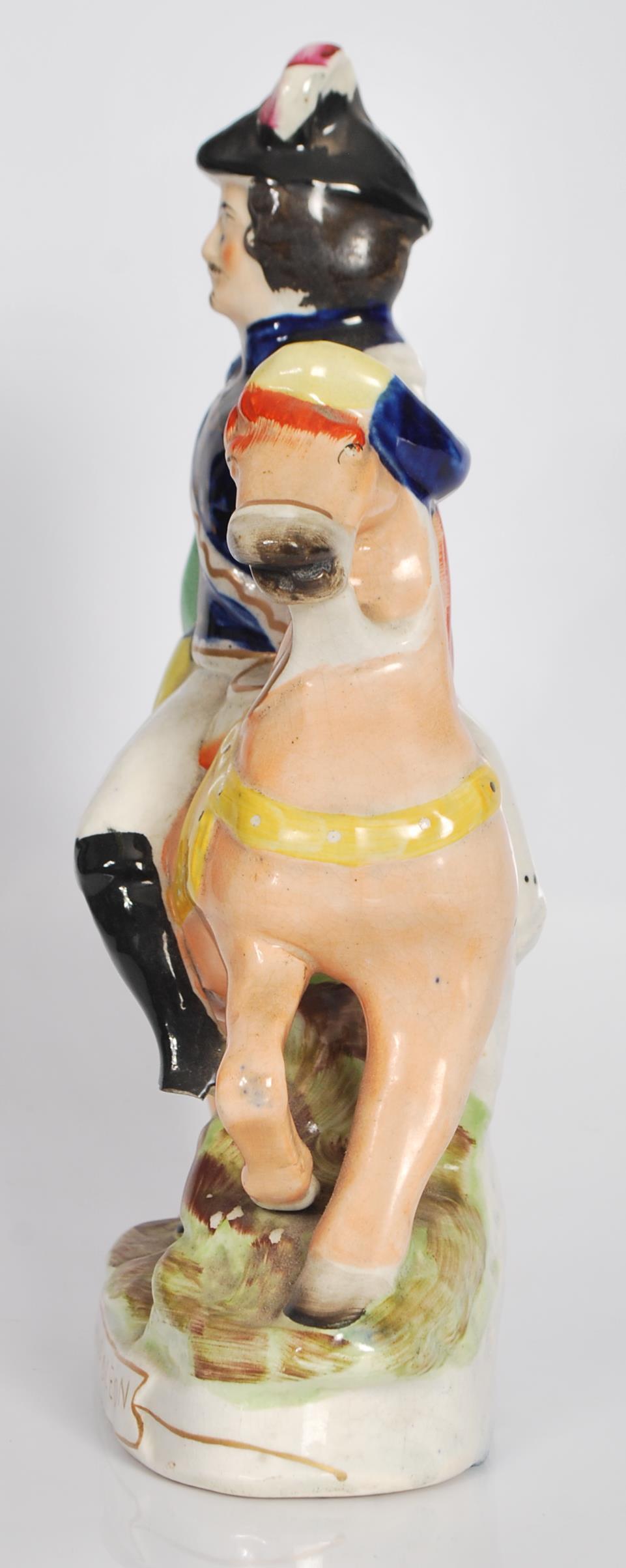 A 19th century Staffordshire flatback figurine of Louis Napoleon Emperor  of France on horseback. - Image 2 of 4