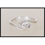 A 950 platinum solitaire diamond ring having an op