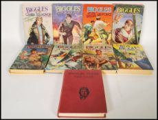 A group of nine Biggles books by W E Johns publish