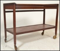 A retro 20th century Danish influence teak wood me