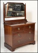 An early 20th Century mahogany dressing chest, swi