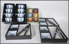 A group of five boxed Oriental ceramic food servin