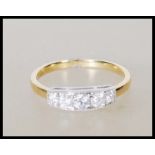 A stamped 750 18ct yellow gold ladies dress ring i