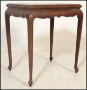 A 20th Century Chinese hardwood occasional side ta