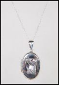 A stamped 925 silver necklace pendant locket havin