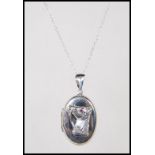 A stamped 925 silver necklace pendant locket havin