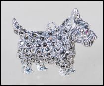 A sterling silver and marcasite pendant in the for