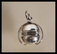 A stamped 925 silver metamorphic locket pendant of