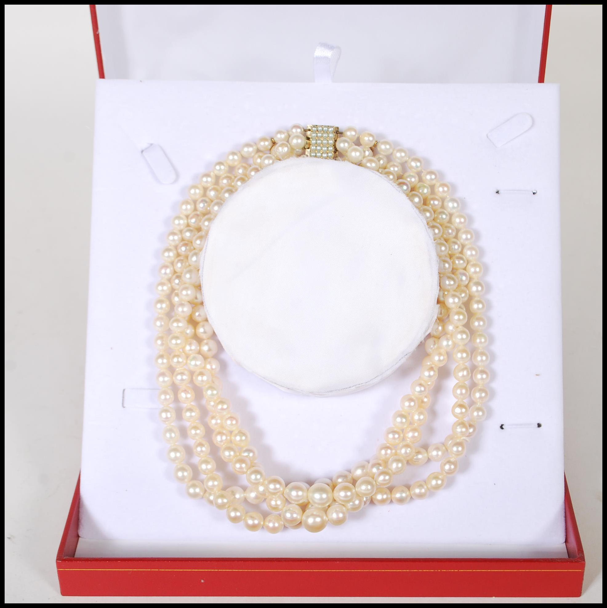 A 20th Century cultured pearl necklace having four