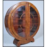 A 1930's Art Deco walnut china roundel display cab