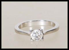 A hallmarked 950 platinum single stone round cut d