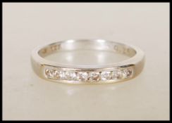 An 18ct English hallmarked white gold ring channel