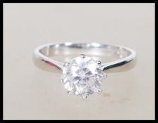 An 18ct white gold single stone solitaire ring hav