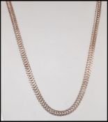 A stamped 925 silver flat link snake chain having