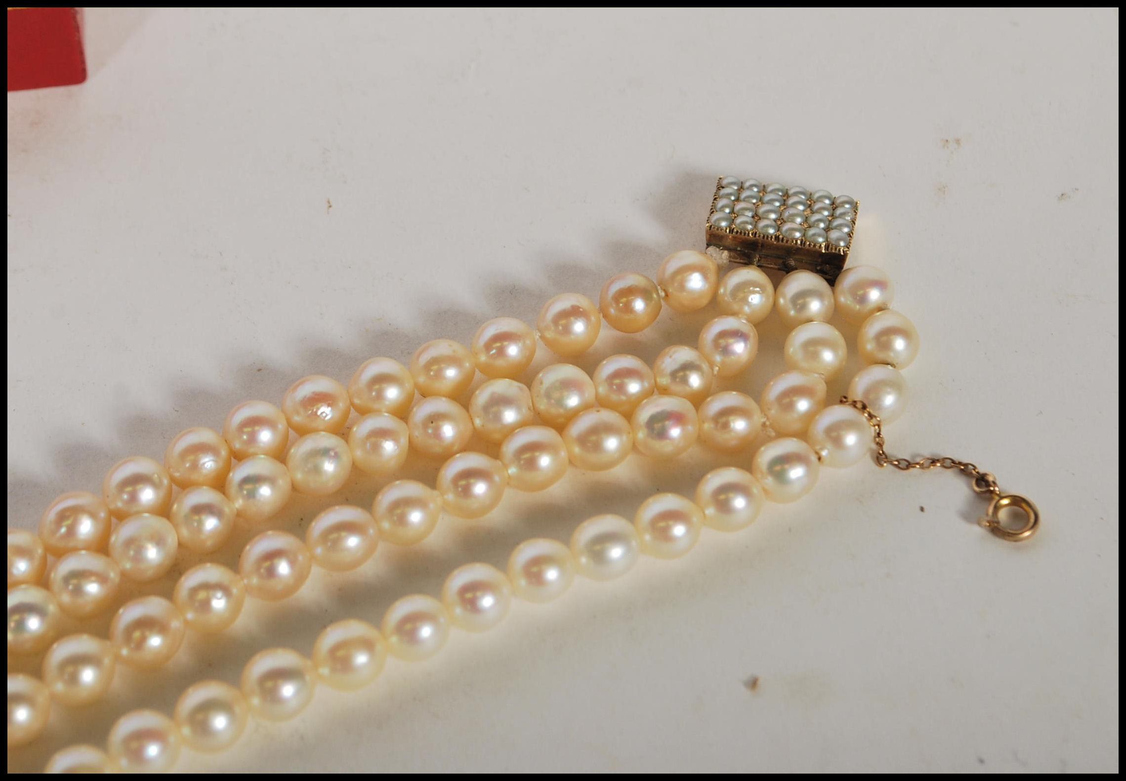 A 20th Century cultured pearl necklace having four - Image 8 of 9