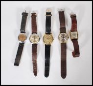 A group of five vintage gentleman's wrist watch of