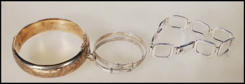 A group of marked silver bracelets to include a ha