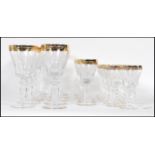 A large collection of glassware having scrolled de