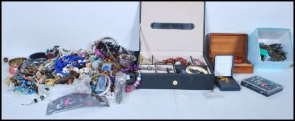 A collection of costume jewellery to include neckl